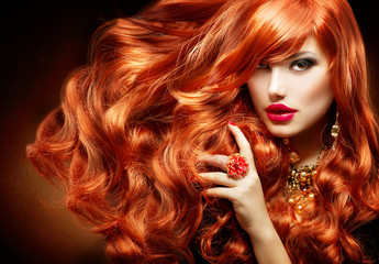 Long Curly Red Hair. Fashion Woman Portrait