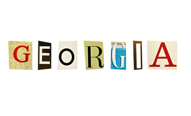 Georgia word formed with magazine letters on a white background