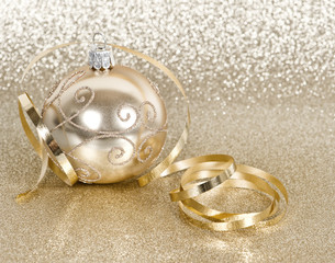 golden christmas ball with streamer