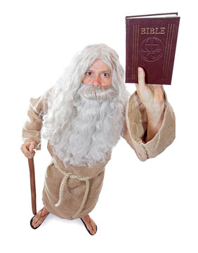 Monk Holding A Bible On White Background