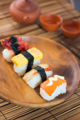 various assorted sushi on a plate