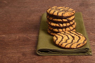 chocolate stripe cookies on green napkin
