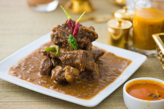mutton korma famous food with traditional indian background item