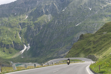 motorcyclist on the rise on the Grossglockner