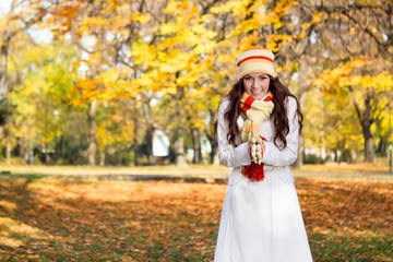 Beautiful modern woman in autumn park