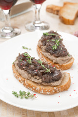 toast with liver pate, caramelized red onion and thyme, vertical
