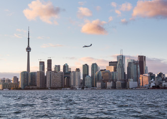 Fototapeta premium Turbo prop aircraft landing at Billy Bishop airport