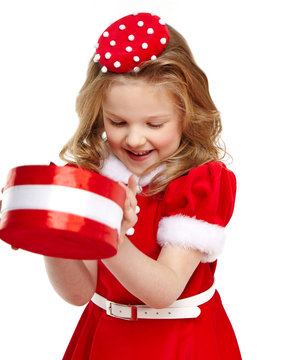 Cute little girl in the santa claus costume