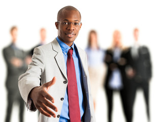 Businessman giving an handshake