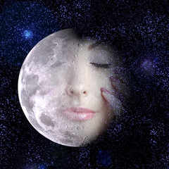 moon turns into face of the beautiful woman in night sky.