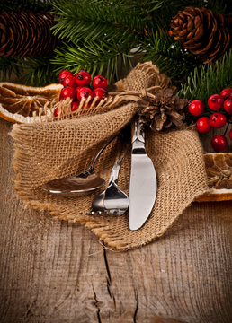 Vintage Silverware On Rustic Wooden Background With Christmas De