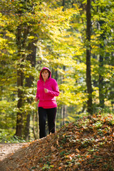 woman running in the forest