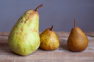 Tree pears on wooden table