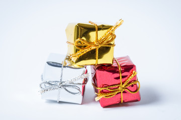 Decorative gifts on white background