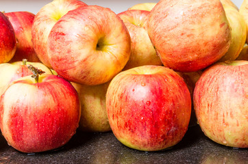 Fototapeta na wymiar Jonagold apples on counter ready to use