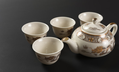 Set of antique teapot and cups