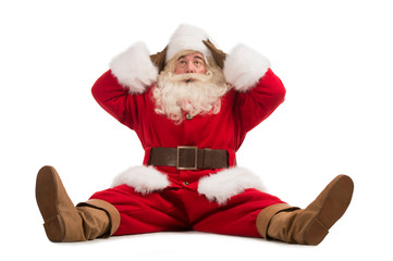 Hilarious and funny Santa Claus confused while sitting