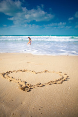 the heart on beach sand