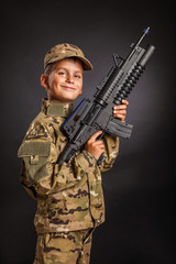 Young soldier with rifle