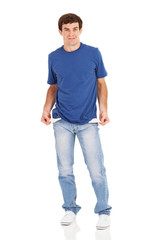 Fototapeta premium man showing empty pockets