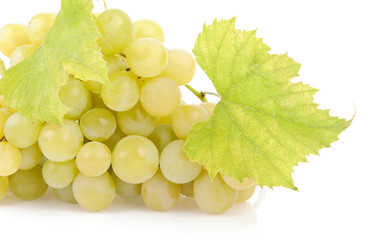 Fresh green grapes with leaves