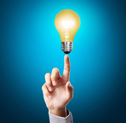 Ideas bulb light on  hand