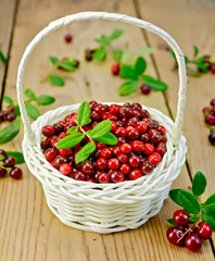 Lingonberries in a white wicker basket