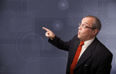 Elegant businessman touching copy space