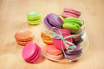 french colorful macarons in a glass