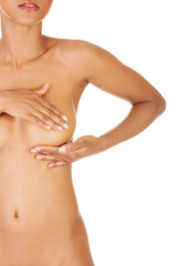 Breasts self-examination. Anti-cancer concept.