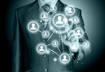 Businessman pressing modern social buttons