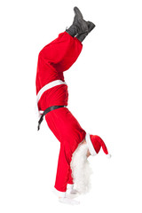 Santa Claus standing head over feet