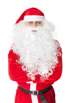Santa Claus standing with hands folded against