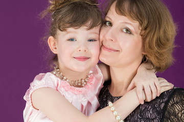 Portrait of a happy mother and daughter