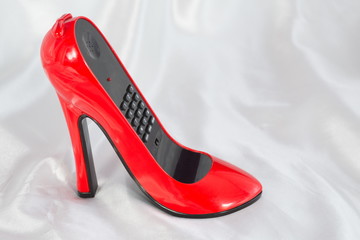 The stylish phone in the form of high-heeled shoes
