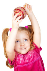 Girl holding a Christmas decoration