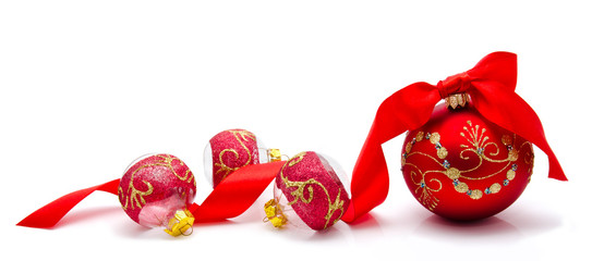 Red christmas balls with ribbon isolated on a white