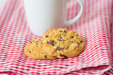Chocolate chips cookies with a drink