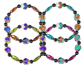 Bracelets made of plastic and glass on a white background. Colla