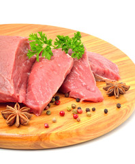 Raw beef and meat slices isolated on white