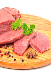 Raw beef and meat slices isolated on white