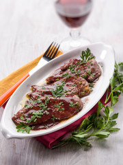 escalope cooked on red wine