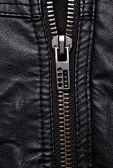 Close-up zipper on black leather jacket