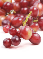 Fototapeta premium red grape on isolated white background