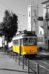 Lisbon old yellow tram over black and white background