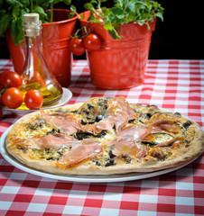 Pizza with ham and other additives