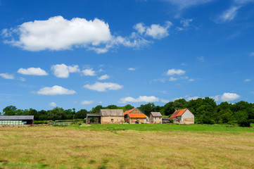 French farmhouse in landscape