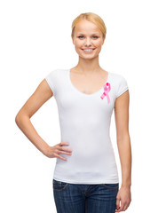 woman in blank t-shirt with pink cancer ribbon