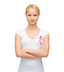 woman in blank t-shirt with pink cancer ribbon