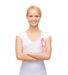 woman in blank t-shirt with pink cancer ribbon